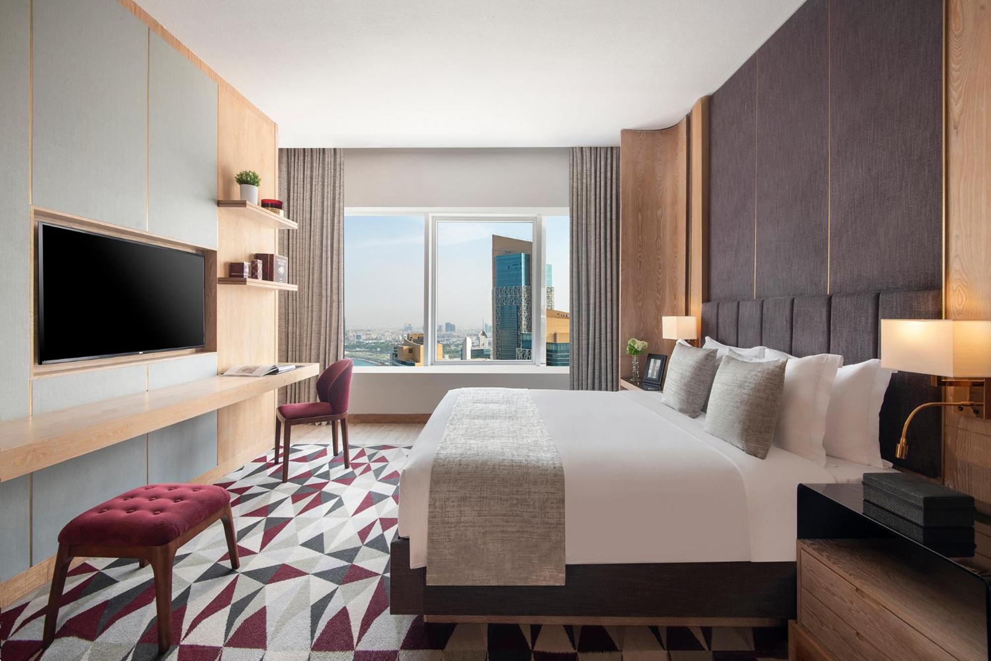 The Bentley Luxury Hotel & Suites Doha Exterior foto Deluxe Room